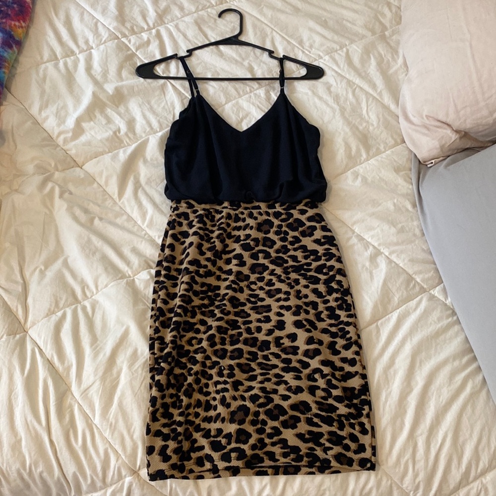 Black and cheetah mini dress. Brand is Guess. Size XS